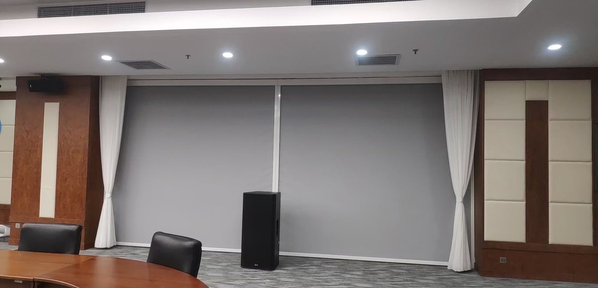 Motorized blackout roller blinds meeting room
