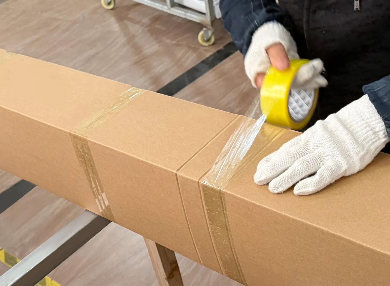 Factory, Quality Control & Packaging for Motorized Blinds Carton sealing during export packing for motorized blinds orders