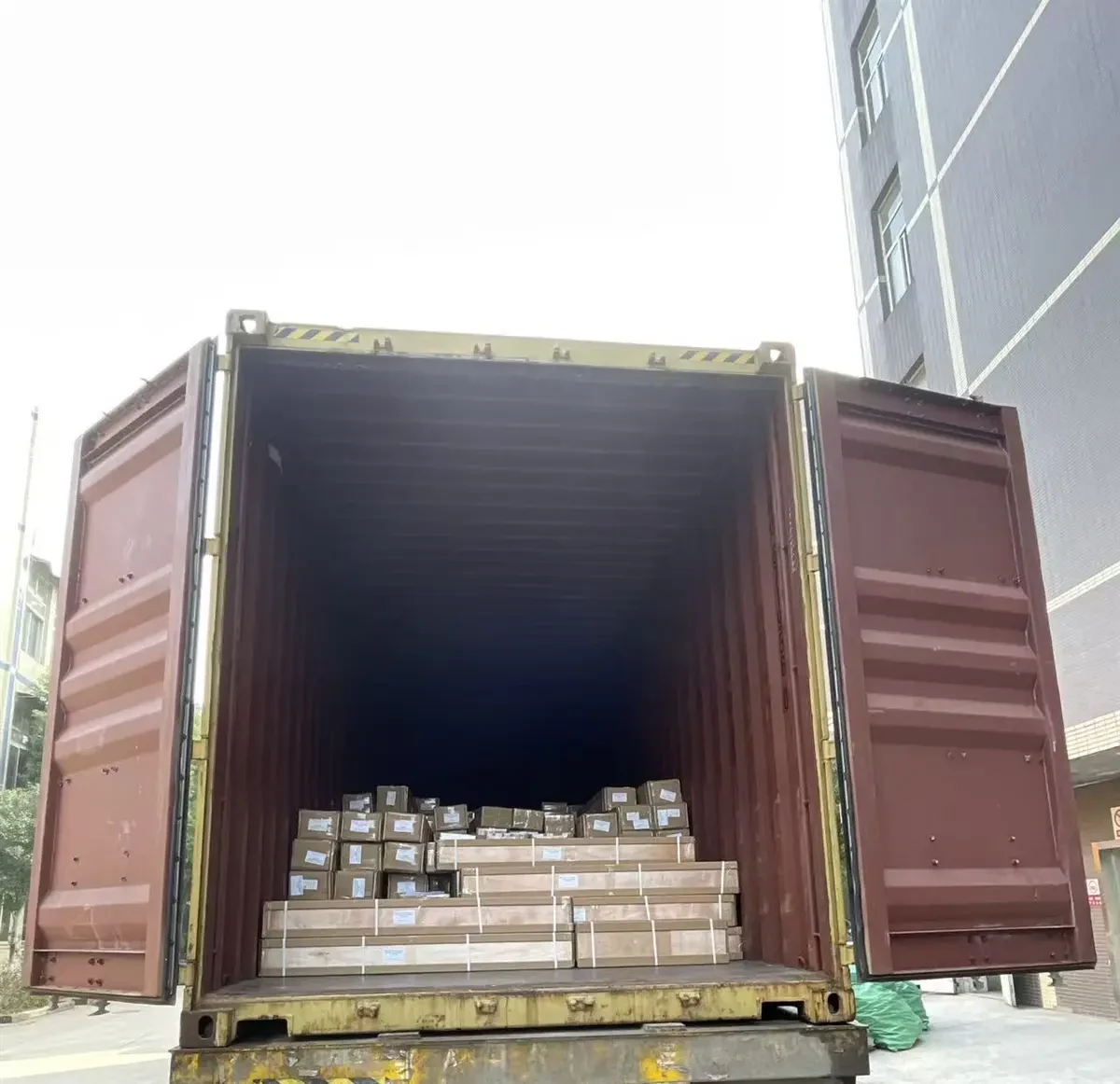 Factory, Quality Control & Packaging for Motorized Blinds Open shipping container loaded with finished export orders