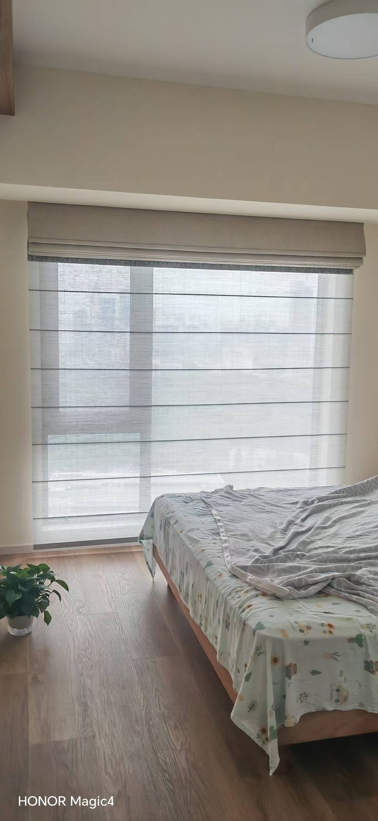 Zebra shades with square cassette in a residential bedroom interior