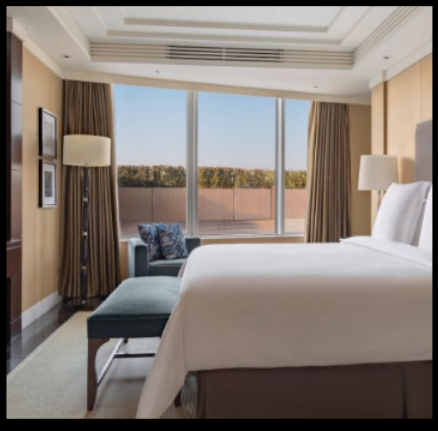Full-height hotel bedroom drapery reference at Four Seasons Hotel Beijing